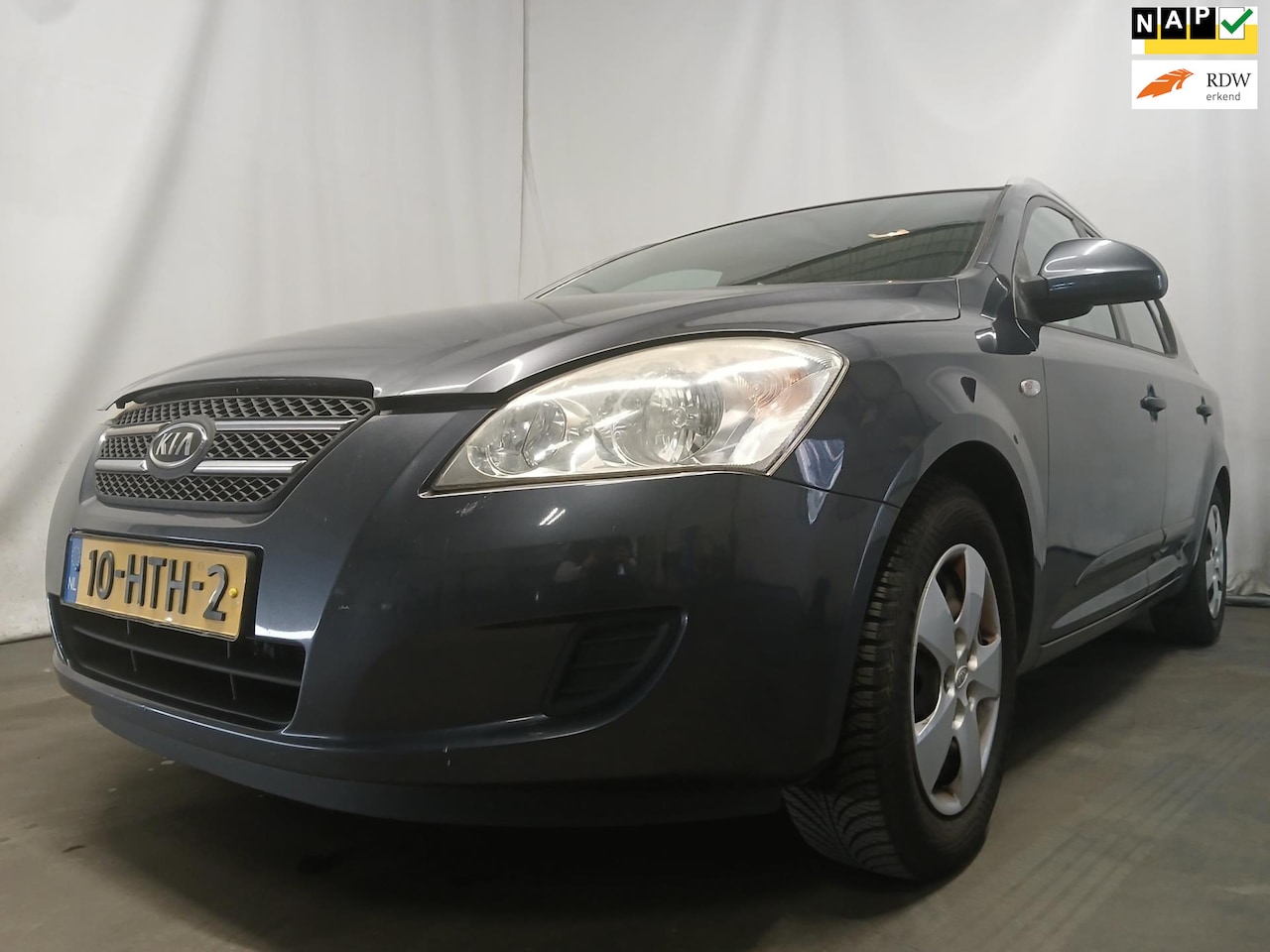 Kia Cee'd Sporty Wagon - 1.4 Fifteen ISG - Airco - Schade - AutoWereld.nl