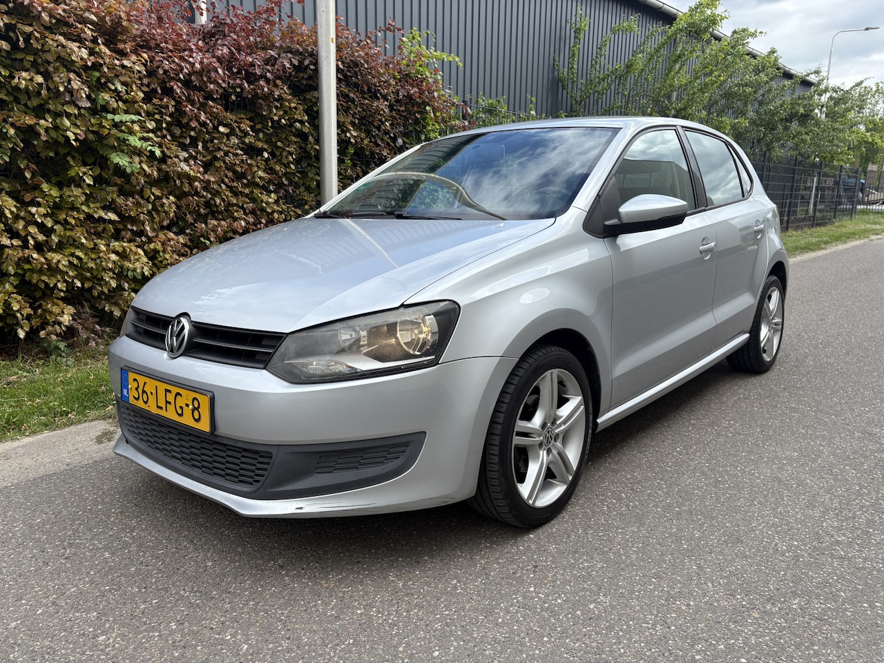 Volkswagen Polo - 1.2 TSI Comfortline / 5-DEURS / AIRCO / NAVI / CRUISE - AutoWereld.nl