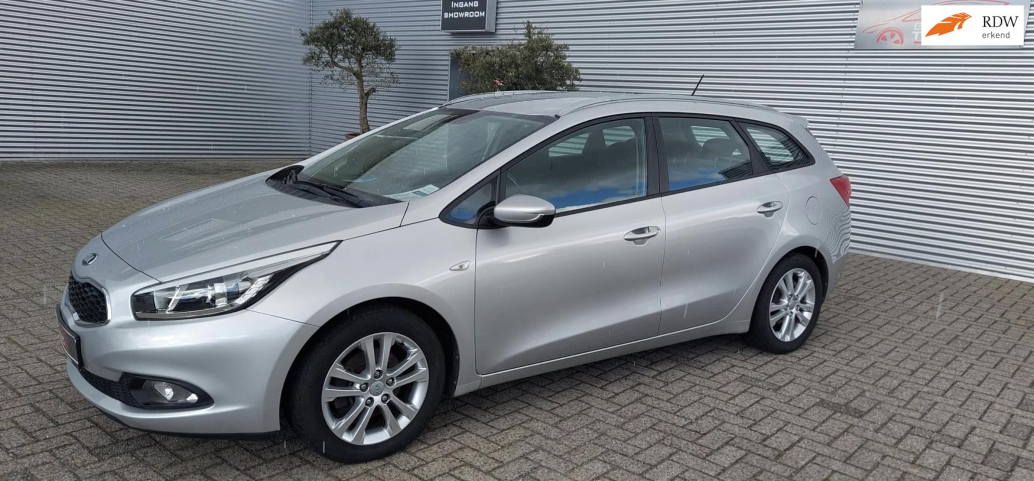Kia Cee'd Sportswagon - 1.4 GDI Comfort Pack (model 2013) afneembare trekhaak, cruise control, airco, - AutoWereld.nl