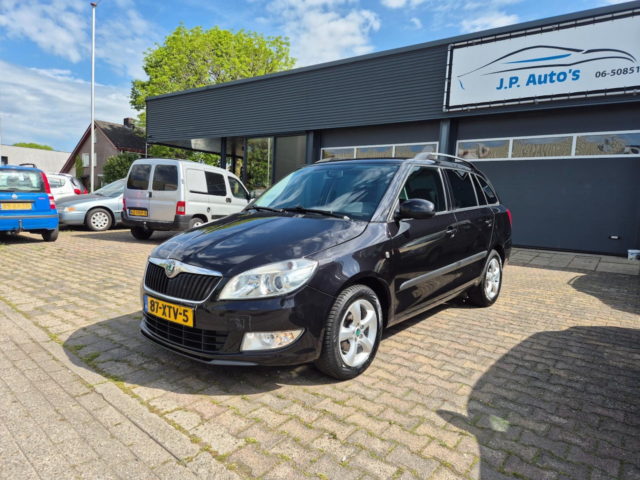 Skoda Fabia Combi - 1.2 TSI Tour 1.2 TSI Tour NIEUWE APK - AutoWereld.nl