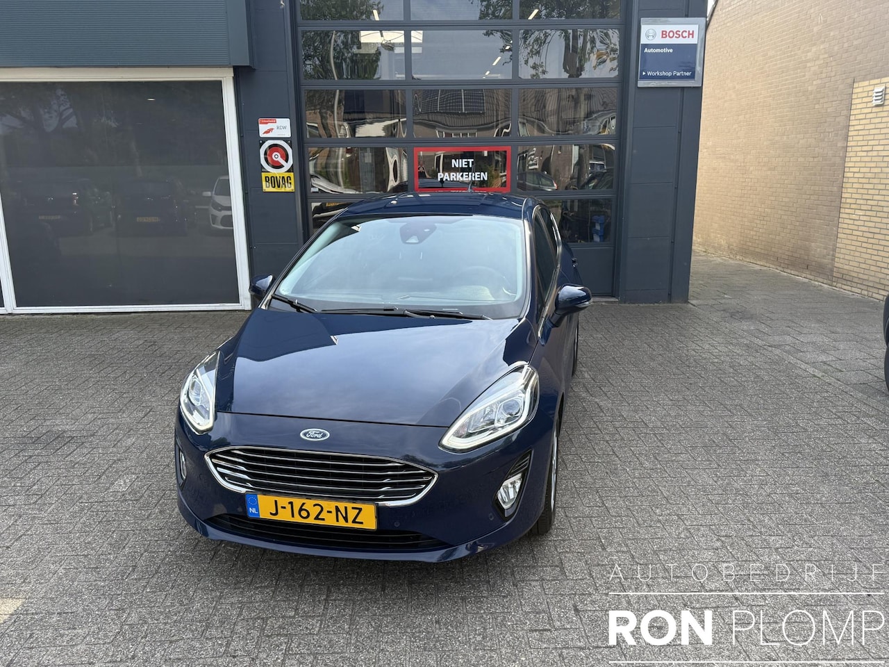 Ford Fiesta - 1.0 EcoBoost Hybrid Titanium X / Airco clima/ Navigatie/ Cruise/ Apple carplay/ PDC/ LED/ - AutoWereld.nl