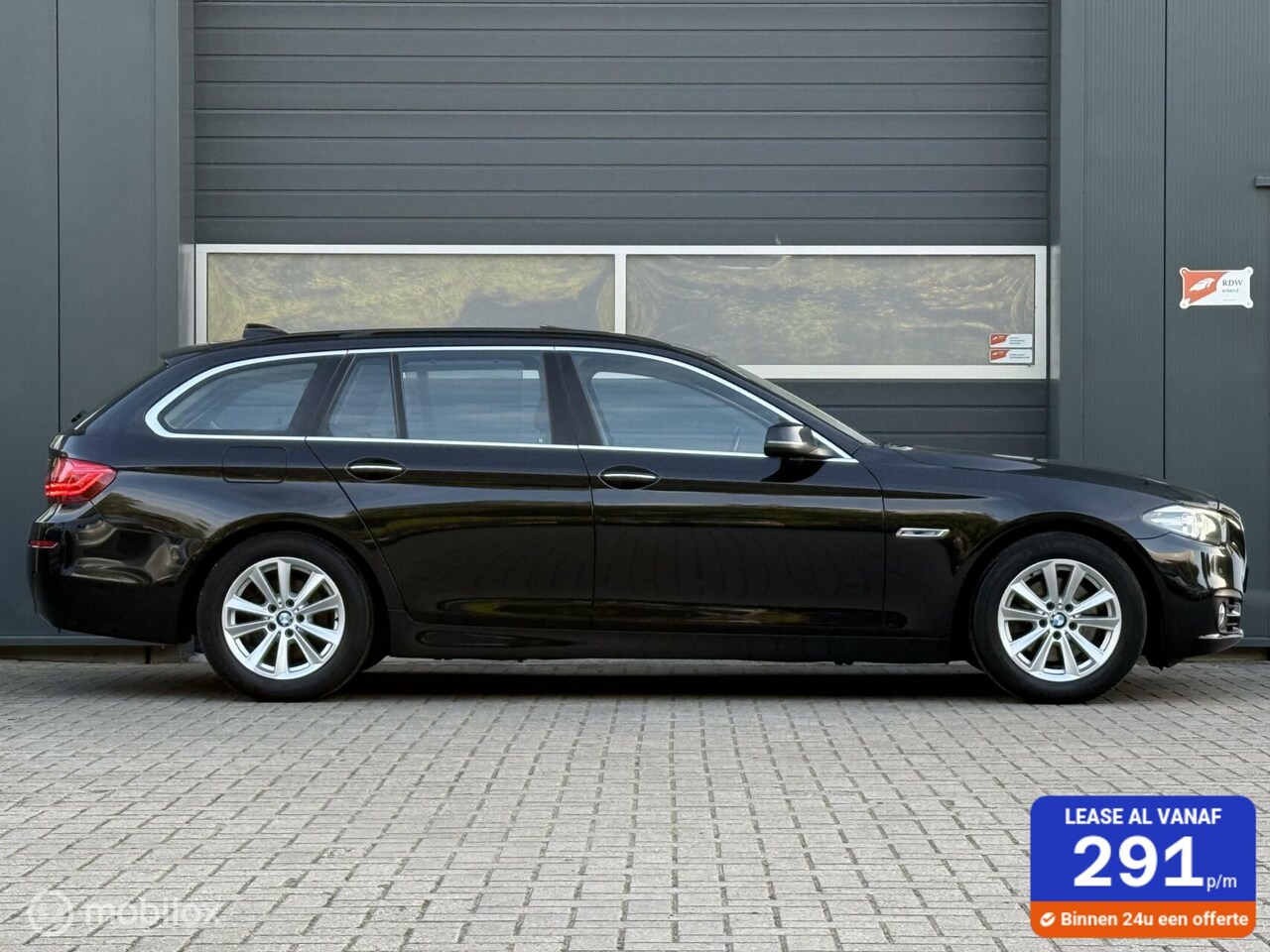 BMW 5-serie Touring - 520d Luxury Edition Panoramadak Sportstoelen Super mooie auto - AutoWereld.nl