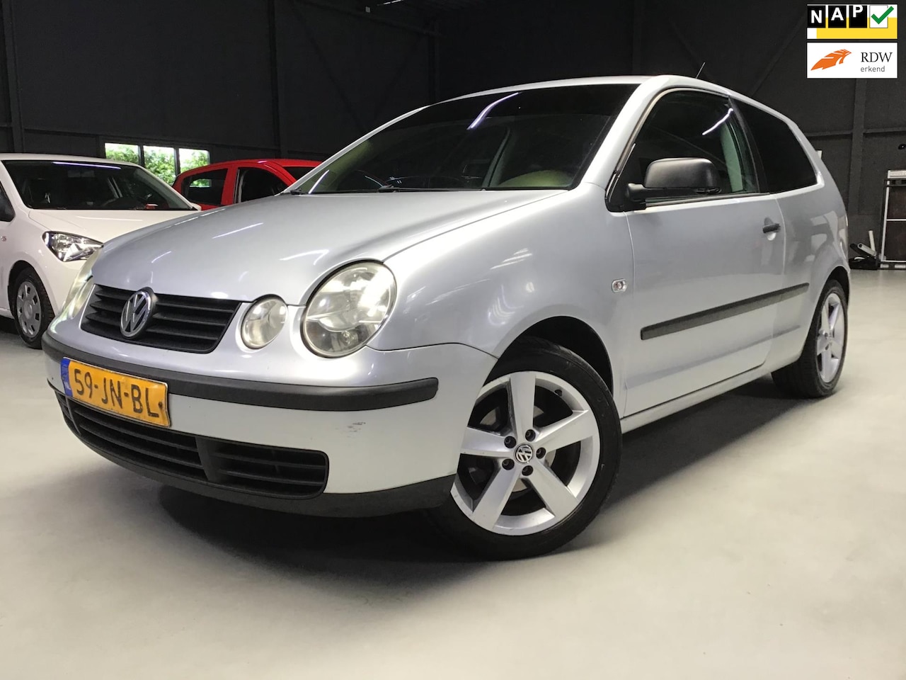Volkswagen Polo - 1.4-16V I Leder I 16inch LMV I Apk 02-2026 I Getint + Chameleon Folie Glas I Trekhaak I Ne - AutoWereld.nl