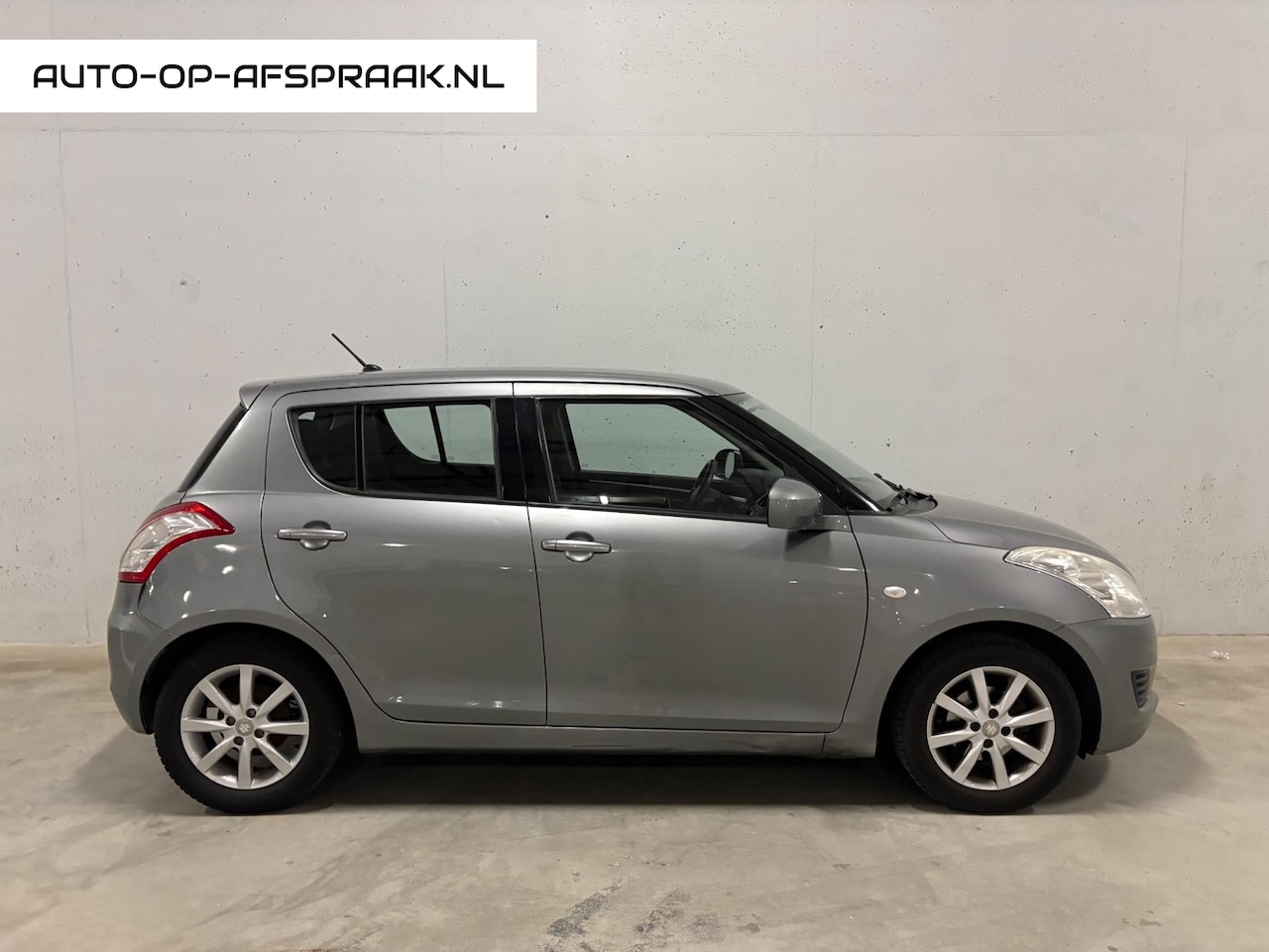 Suzuki Swift - 1.2 Comfort EASSS 5drs. Airco Cruise - AutoWereld.nl