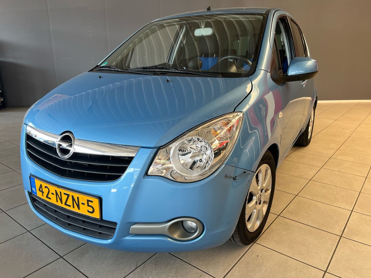 Opel Agila - 1.2 Edition 2e eigenaar - Style pakket - Airco - betrouwbaar! 365 dagen garantie, Bovag af - AutoWereld.nl