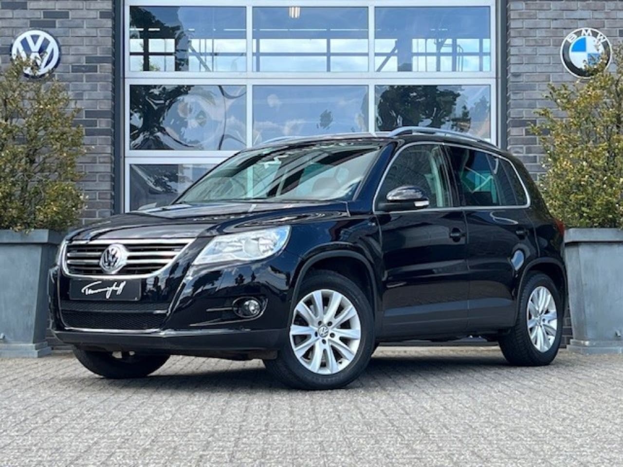 Volkswagen Tiguan - 2.0 TSI 200PK SPORTenST.4M AUT. - TREKH. - ORG. NL. - AutoWereld.nl