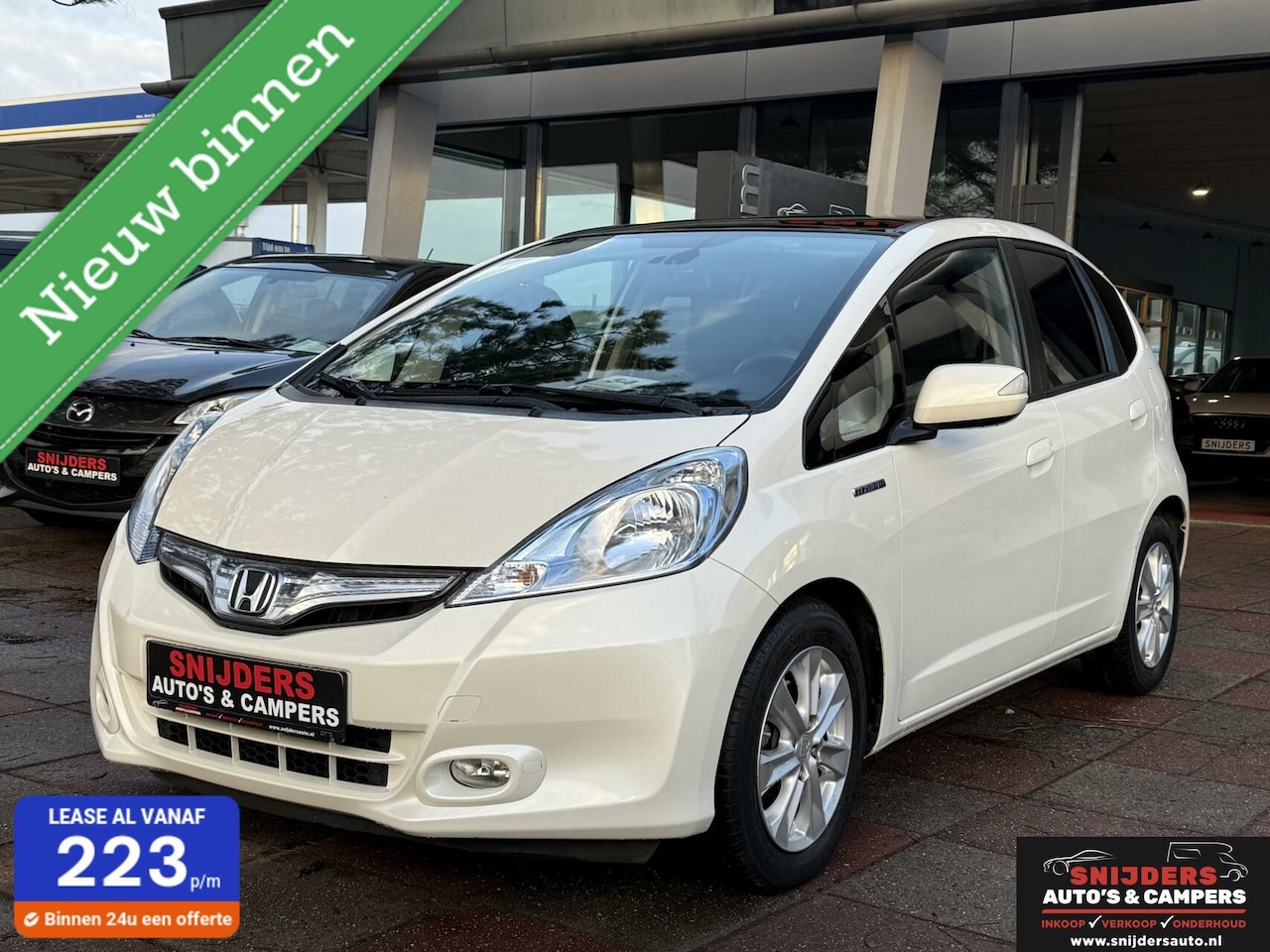Honda Jazz - 1.4 Hybrid Elegance 1.4 Hybrid Elegance - AutoWereld.nl
