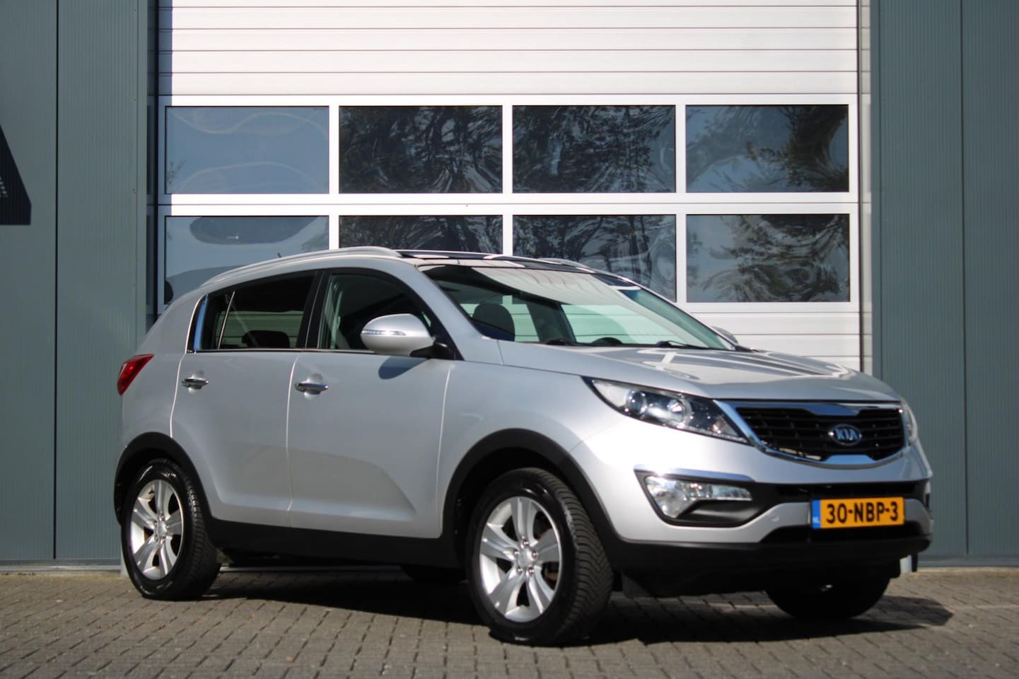 Kia Sportage - 2.0 X-ecutive Plus Pack First Edition 163pk Clima/Cruise/Panodak/Bluetooth/PDC/RadioCD.AUX - AutoWereld.nl