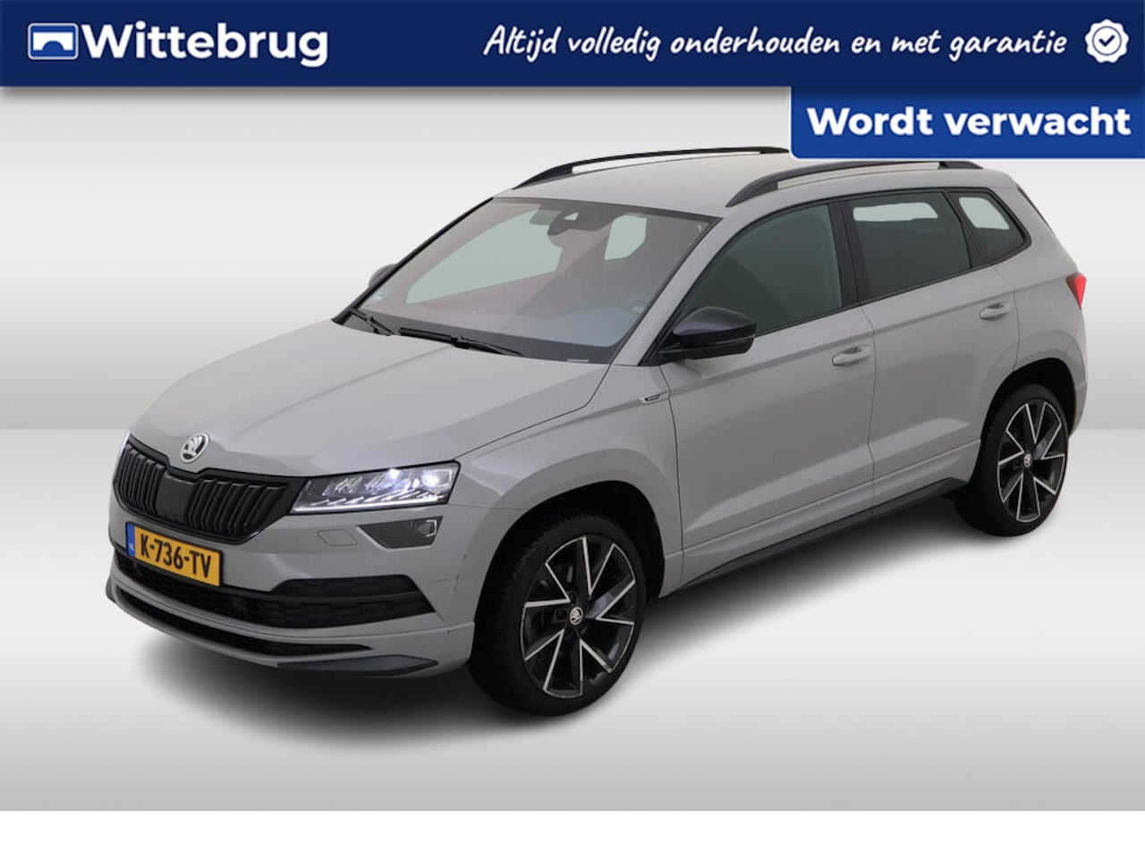 Skoda Karoq - 1.5 TSI ACT Sportline Business / AUTOMAAT/ CAMERA/ PARK. SENSOREN/ LED/ ELEK. ACHTERKLEP/ - AutoWereld.nl