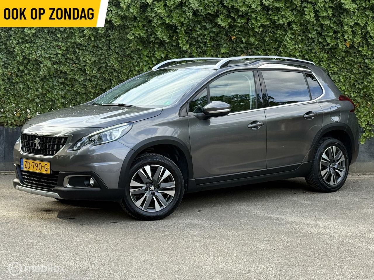 Peugeot 2008 - 1.2 PureTech Allure | Grip Control | Clima - AutoWereld.nl