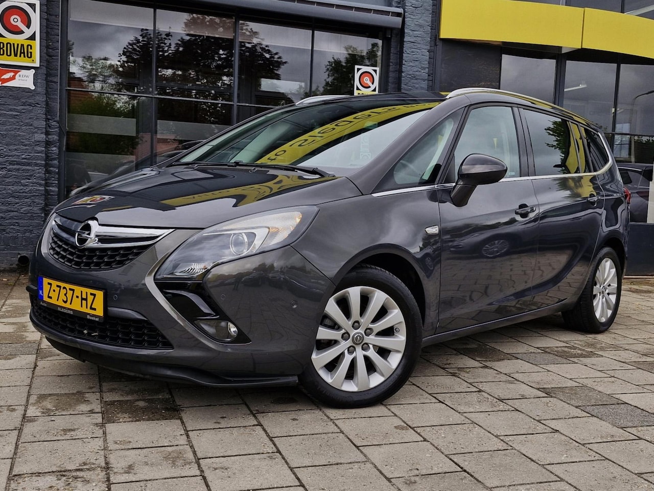 Opel Zafira Tourer - 1.4 Innovation Automaat 7pers. 1300KG Trekg. | Stoelv. | Cam + Sens| Comf. Stoelen |Leder - AutoWereld.nl