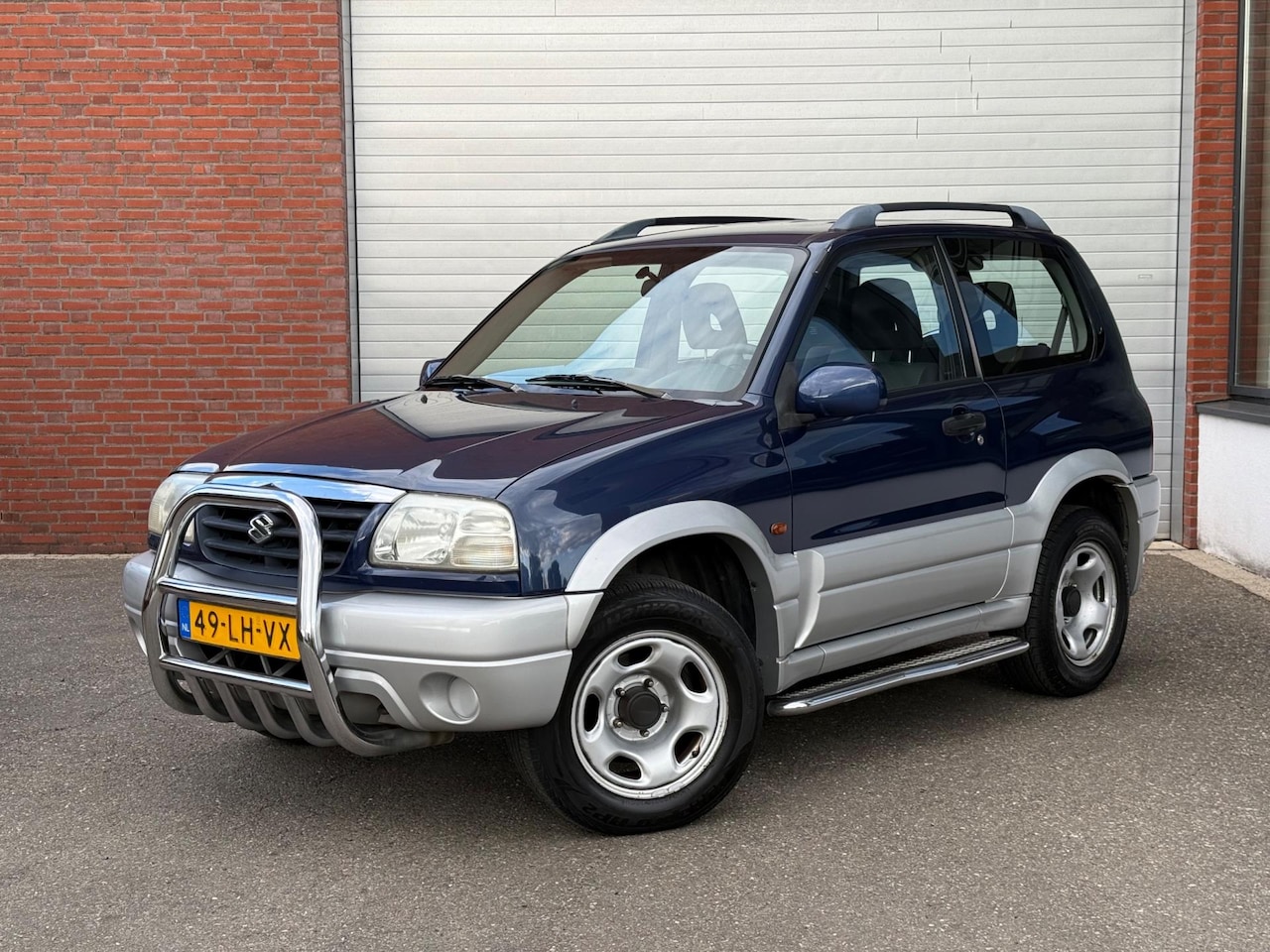 Suzuki Grand Vitara - 2.0 S-Limited| AUTOMAAT| 4WD| NAP| AIRCO - AutoWereld.nl