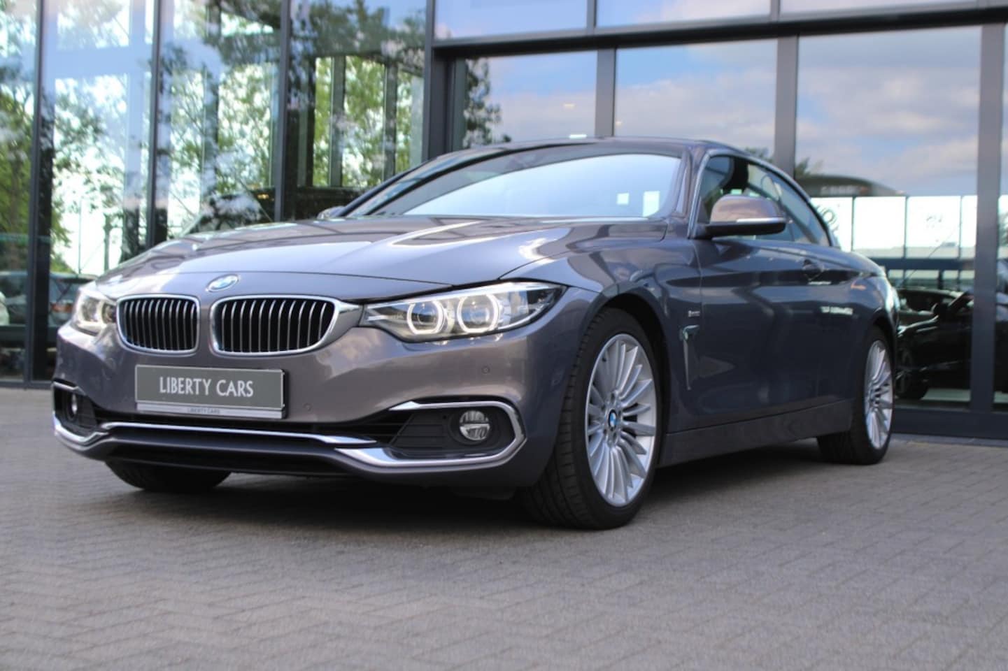BMW 4-serie Cabrio - 420I Luxury Line Cabriolet Hardtop Airscarf Leder Camera el. tre - AutoWereld.nl