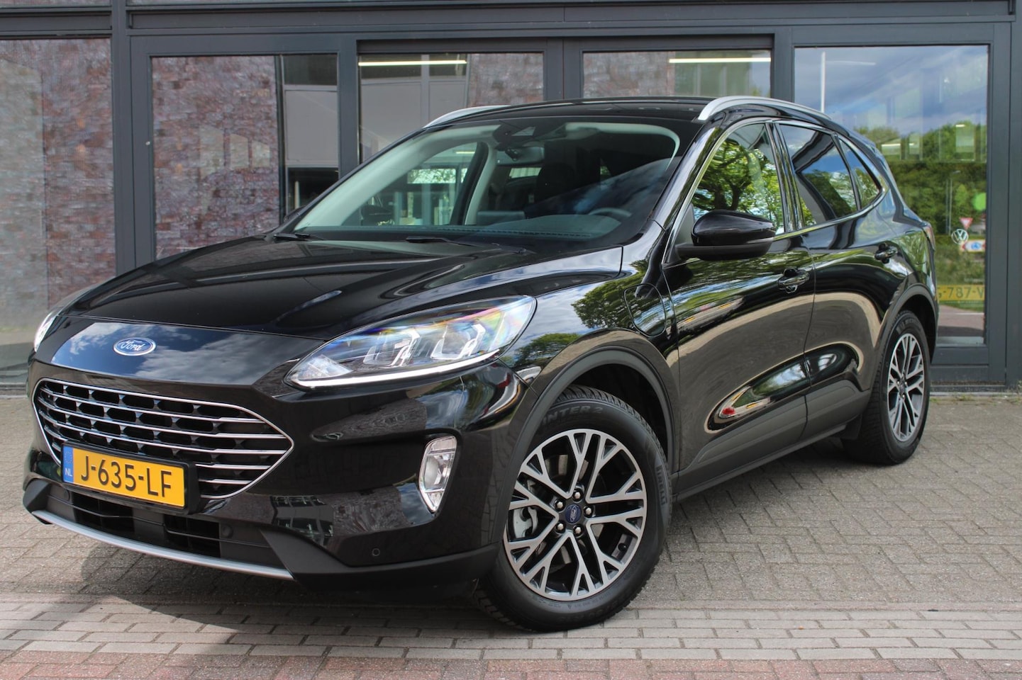 Ford Kuga - 2.5 PHEV Titanium | Keyless | Cruise Control | Carplay | Trekhaak 1200kg | Rondom parkeers - AutoWereld.nl