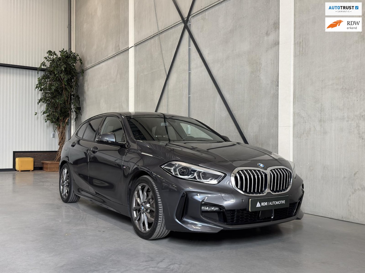 BMW 1-serie - 118i High Executive M Sport - AutoWereld.nl