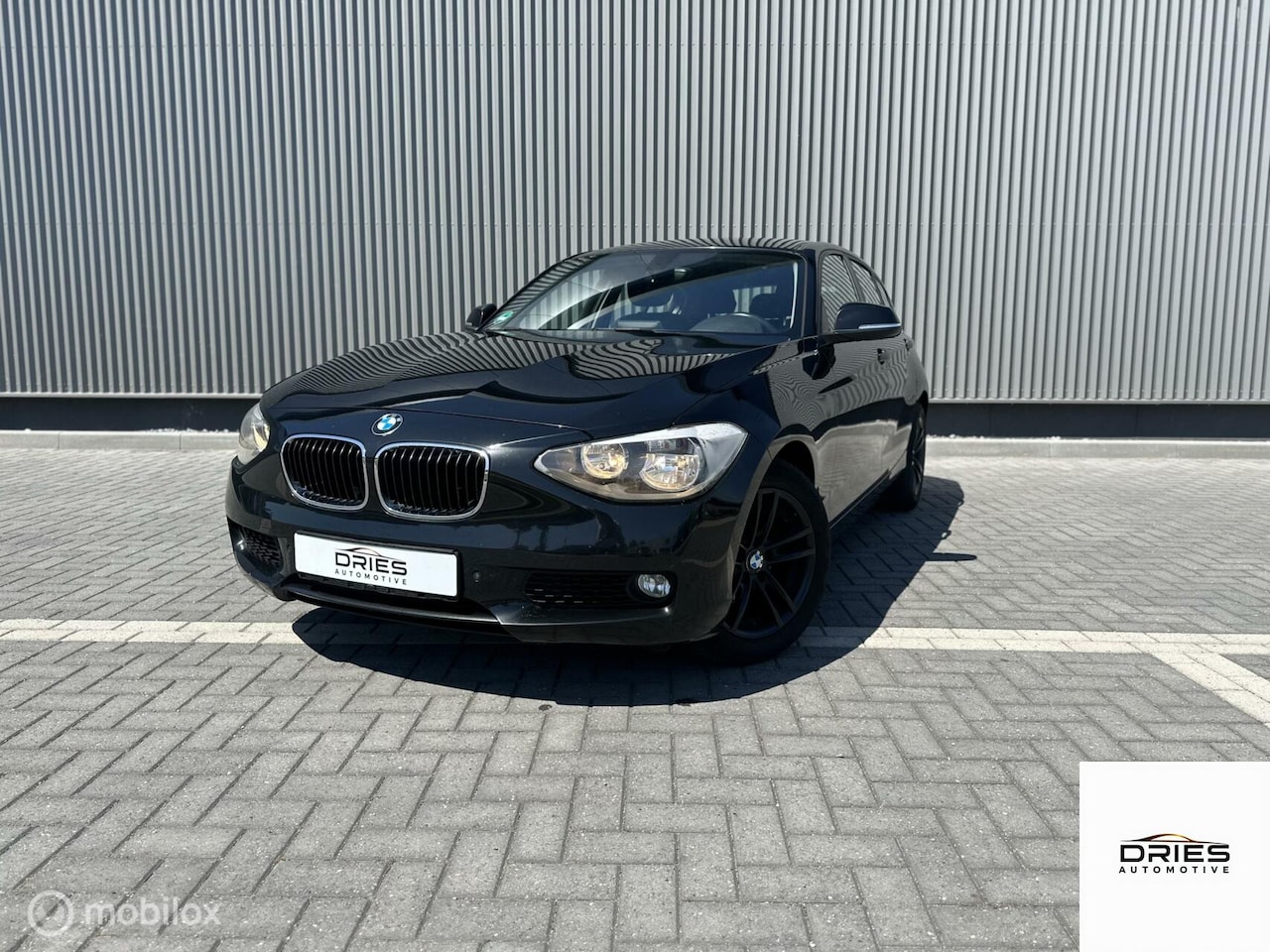 BMW 1-serie - 116i Business Airco l Stoelverwarming l Navi - AutoWereld.nl