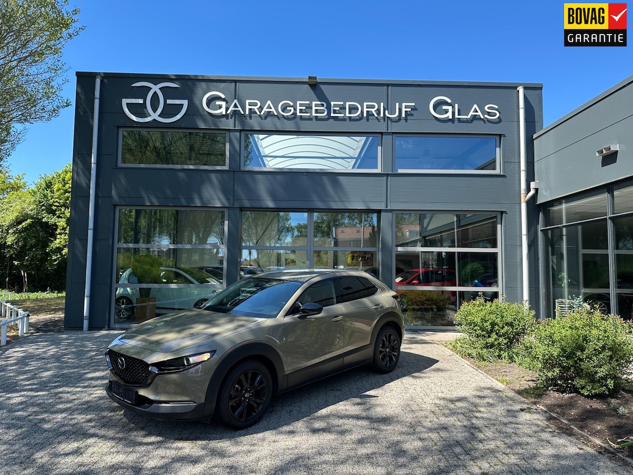 Mazda CX-30 - 2.0 e-SkyActiv-G M Hybrid Nagisa - zircon zand - AutoWereld.nl