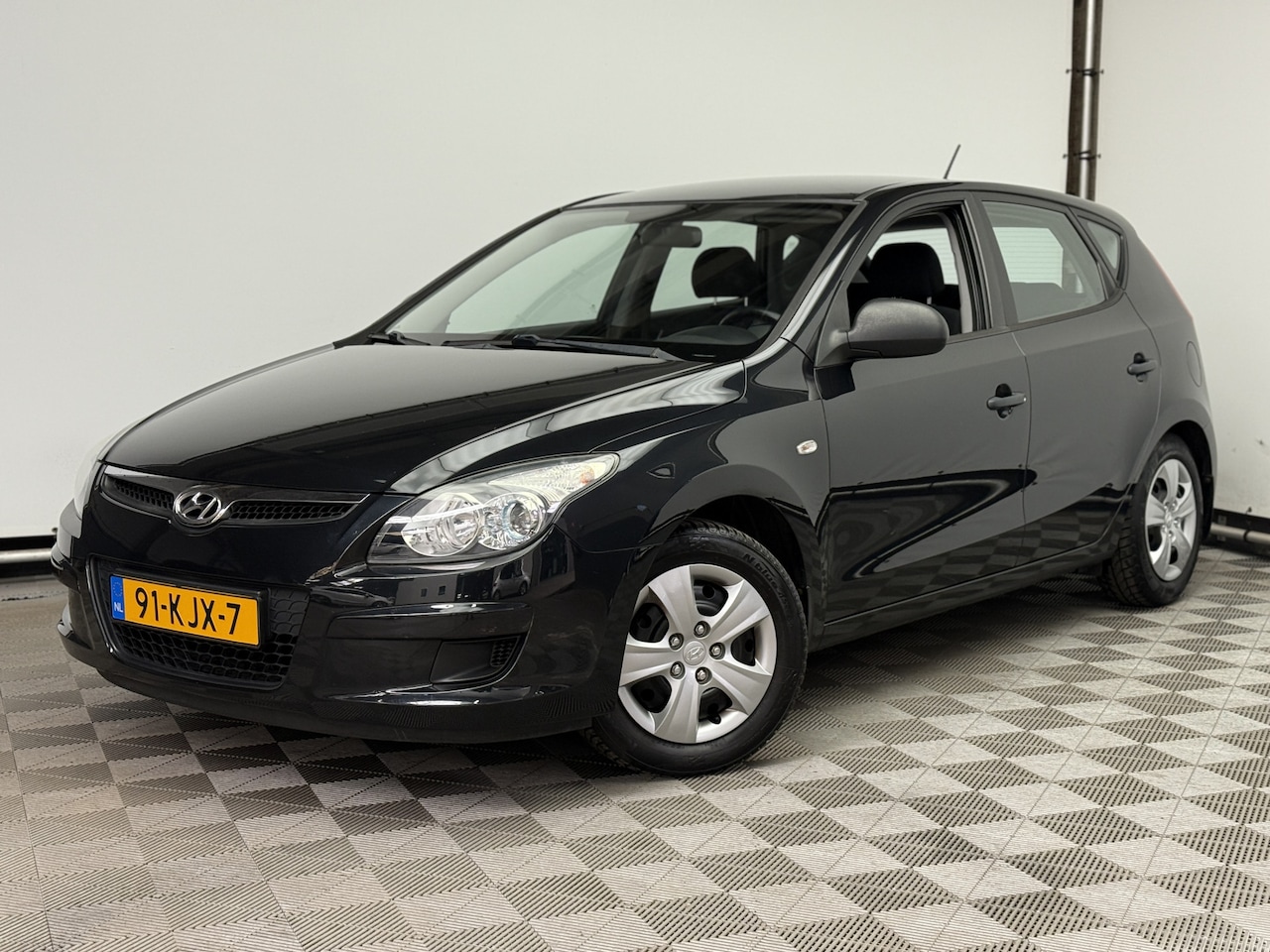 Hyundai i30 - 1.4i Active Cool Airco 5-drs NL Auto - AutoWereld.nl