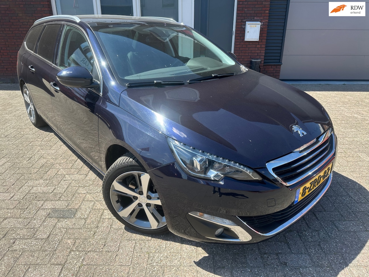 Peugeot 308 SW - 1.2 e-THP Première / Pano / Leder / Navi / PDC / LED - AutoWereld.nl
