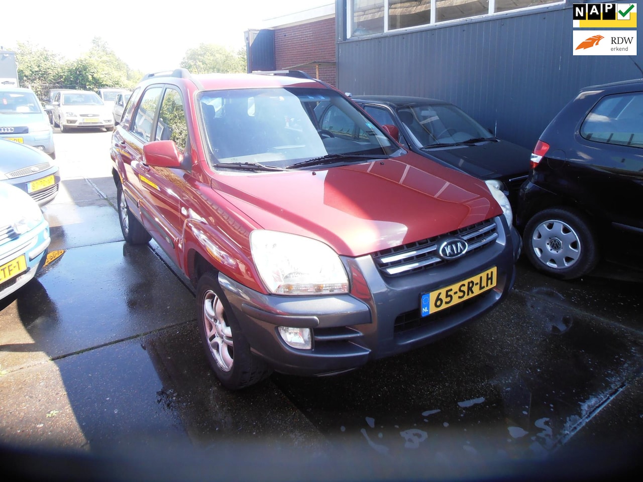 Kia Sportage - 2.0 CVVT Executive 2.0 CVVT Executive - AutoWereld.nl