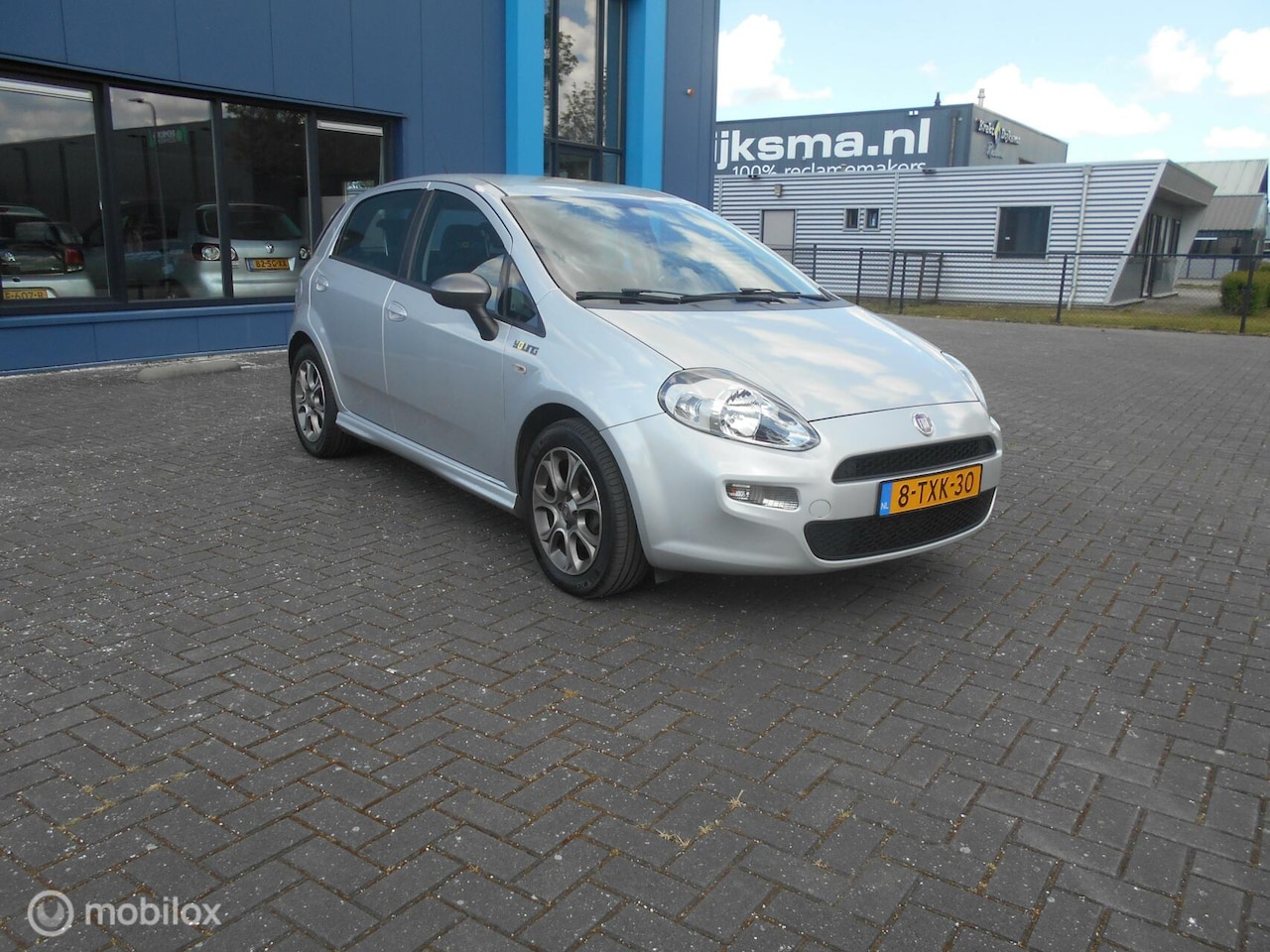 Fiat Punto Evo - 0.9 TwinAir Young Trekhaak!! Airco!! - AutoWereld.nl