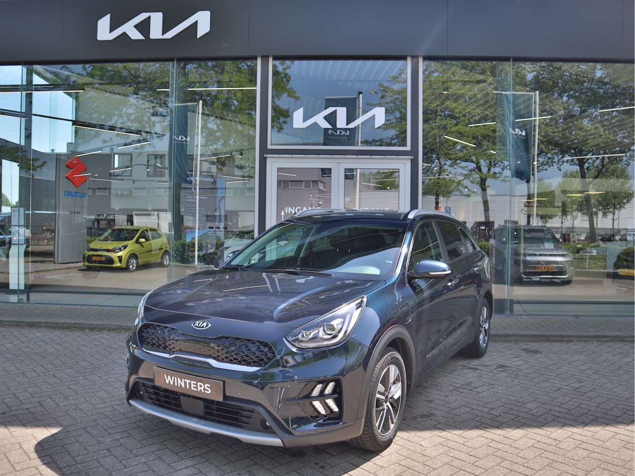 Kia Niro - 1.6 GDi PHEV Plug-In-Hybrid ExecutiveLine Leder | Stoelverw+Koeling | Navigatie | Camera | - AutoWereld.nl