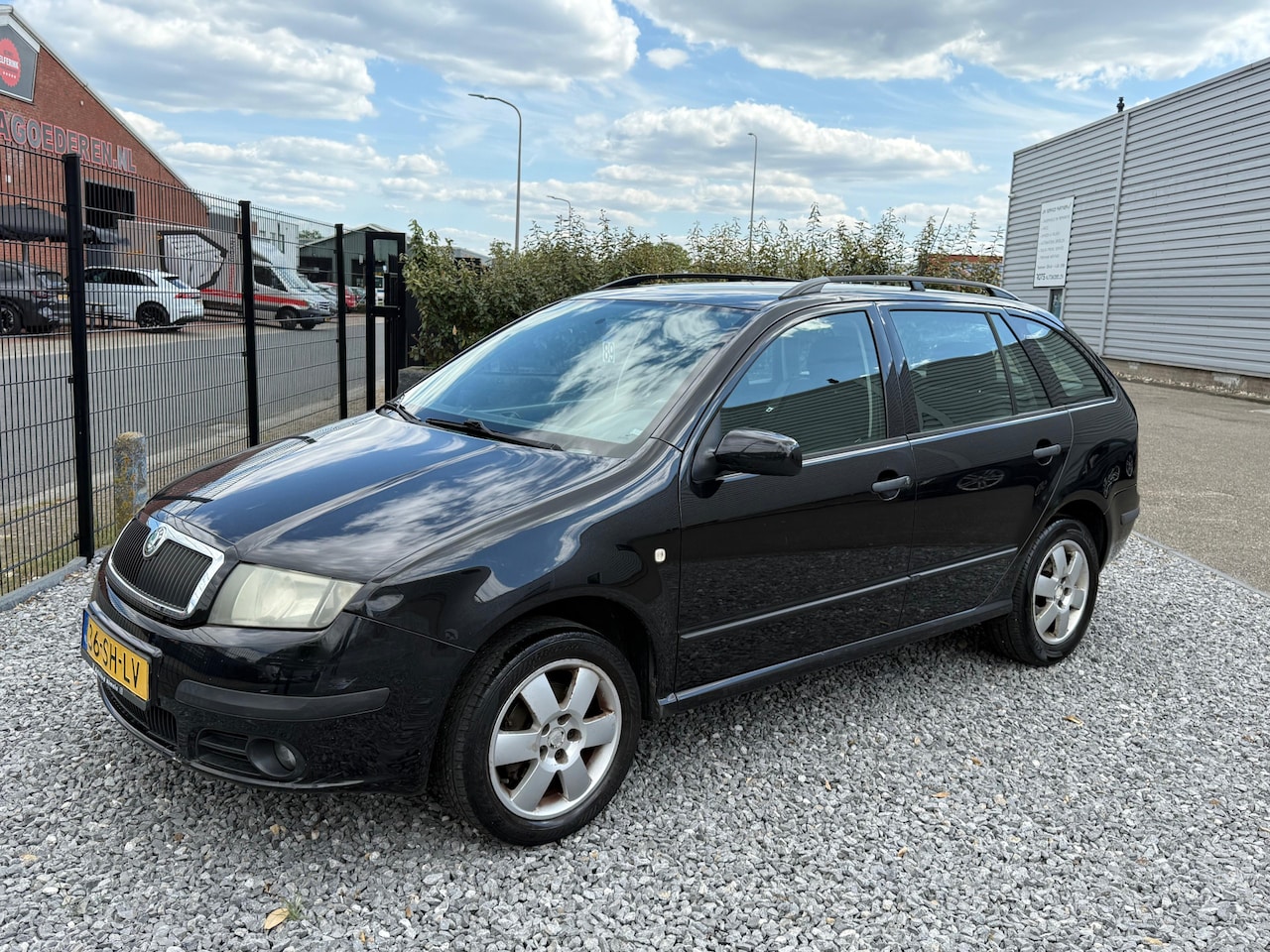 Skoda Fabia Combi - 1.4-16V Equipe plus Airco|Cruis|PDC Zwart - AutoWereld.nl