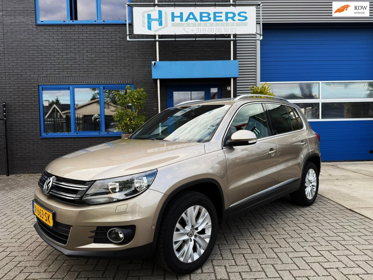Volkswagen Tiguan - 1.4 TSI Sport&Style 122PK|Radio|Climate|StoelVW|Cruise Control|Bluetooth|Trekhaak|Inparker - AutoWereld.nl