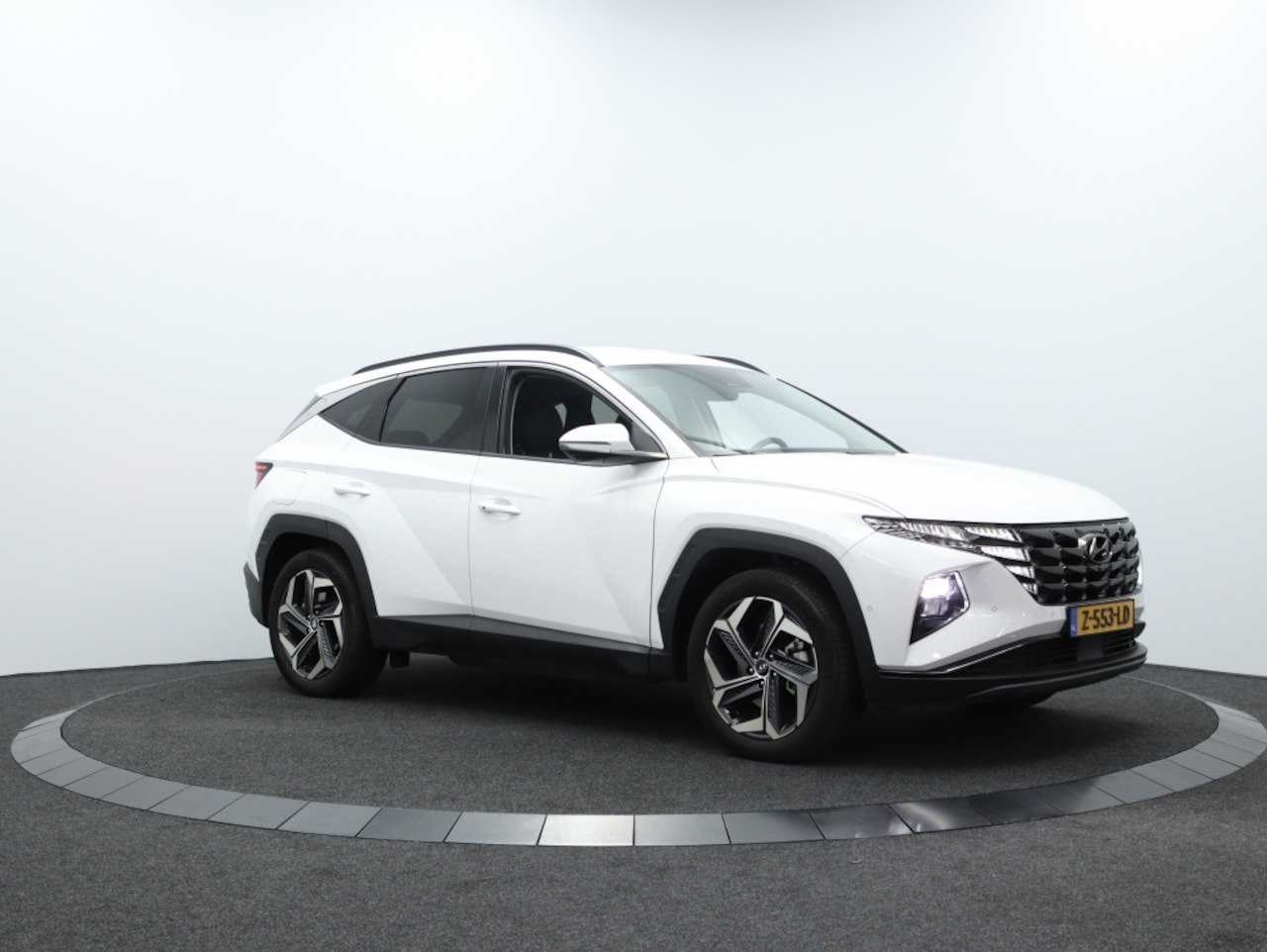 Hyundai Tucson - 1.6 T-GDI PHEV Premium | Leder | Navi | Apple carplay | Stoelven - AutoWereld.nl
