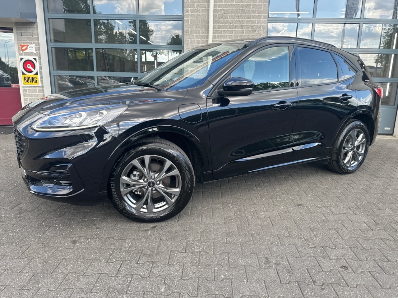 Ford Kuga - 2.5 PHEV ST-Line X | CAMERA | LEER/ALCANTARA | - AutoWereld.nl