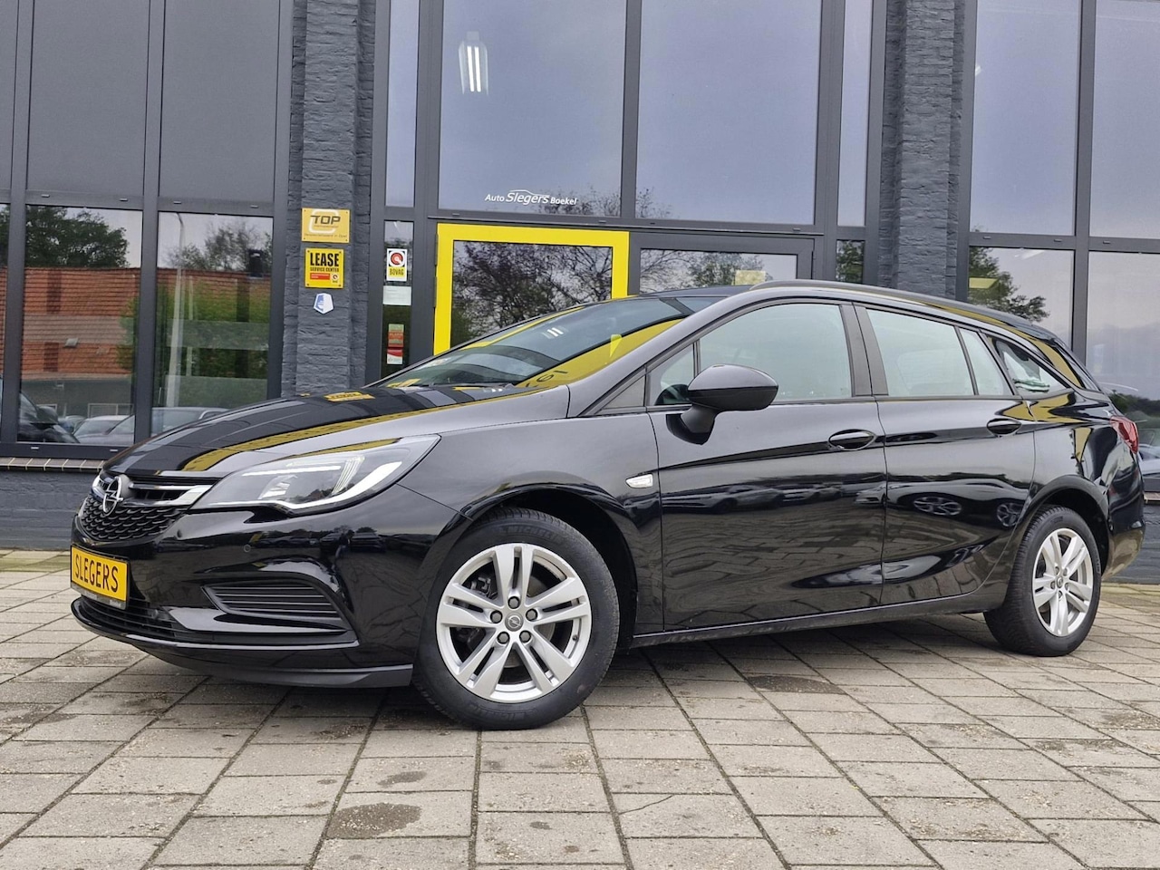 Opel Astra Sports Tourer - 1.0 Business Executive | Parkeer Sensoren Voor en Achter | Navigatiesysteem | Cruise Contr - AutoWereld.nl