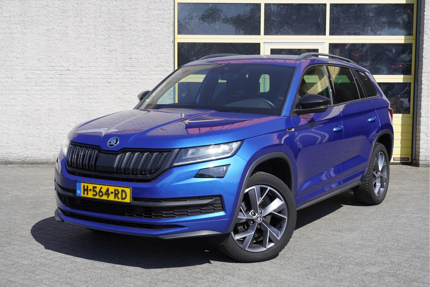 Skoda Kodiaq - 1.5 TSI 150PK! Automaat Sportline Business BJ2020 Lmv 19" | Led | Pdc | Navi | Keyless ent - AutoWereld.nl