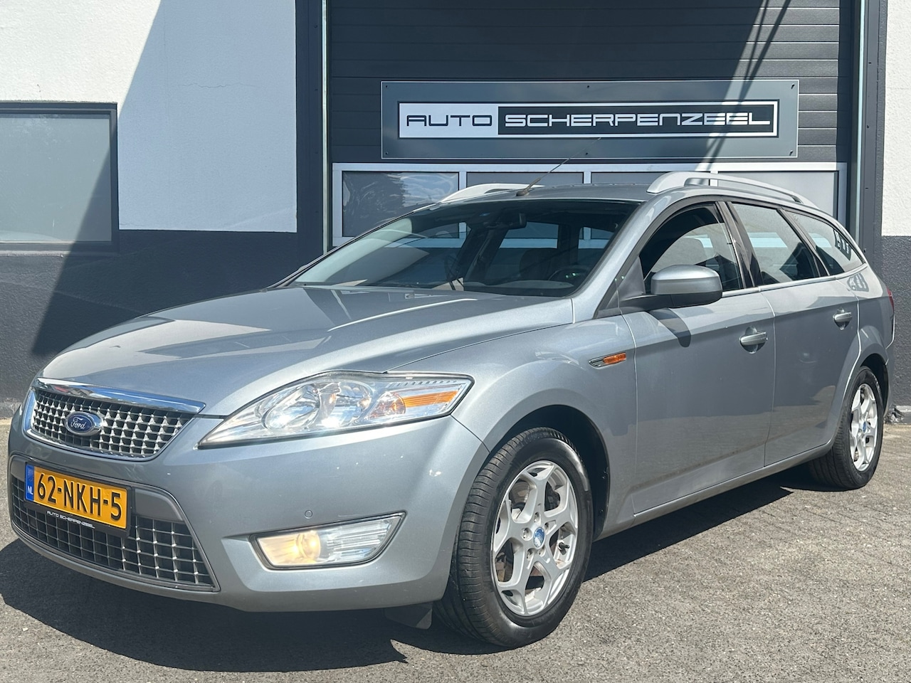 Ford Mondeo Wagon - 2.0-16V Limited | AIRCO | NAVI | TREKHAAK | CC | - AutoWereld.nl