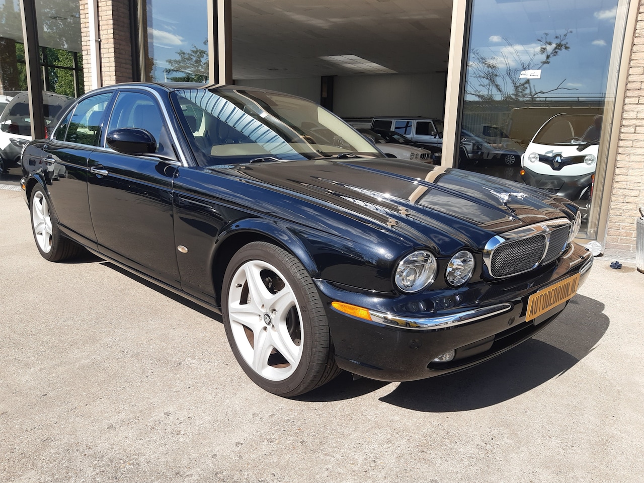 Jaguar XJ - 4.2 V8 Supercharger 291Kw/395Pk LWB - AutoWereld.nl