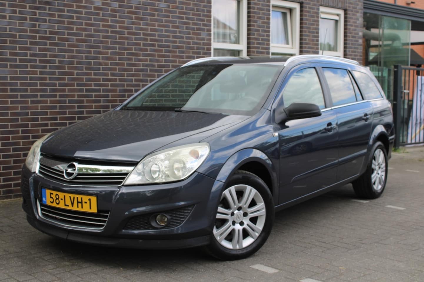 Opel Astra Wagon - 1.6 Cosmo-clima-navi-leer-pdc - AutoWereld.nl