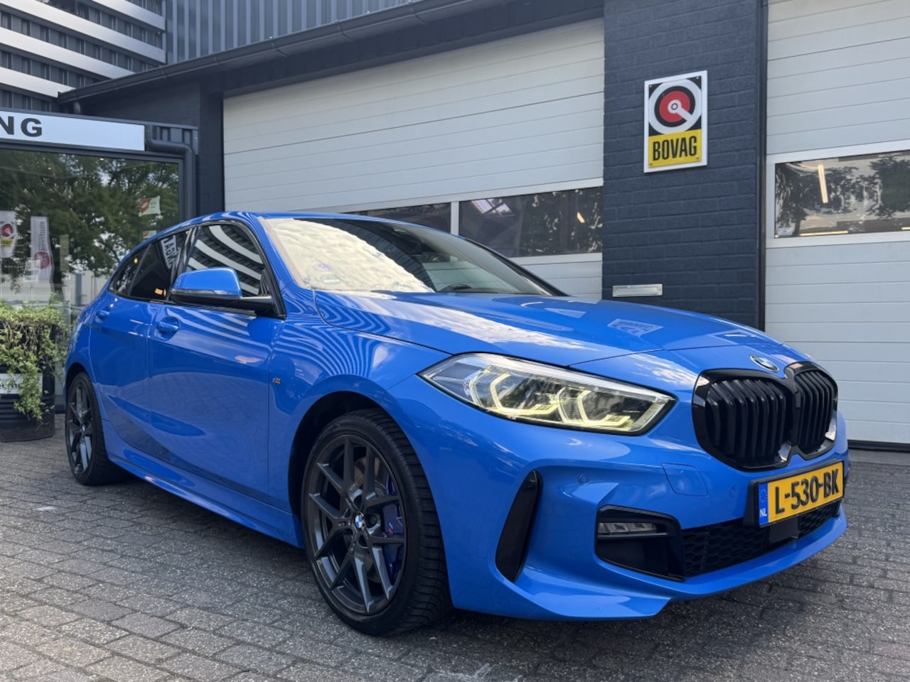 BMW 1-serie - 118i M-sport High Executive Leer/pano/Vol - AutoWereld.nl