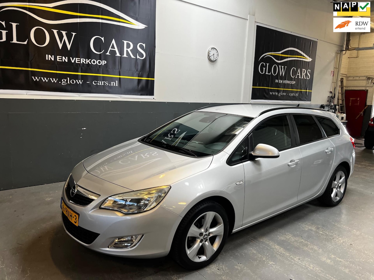Opel Astra Sports Tourer - 1.4 Turbo Edition AIRCO|TREKHAAK|NAP|PDC| - AutoWereld.nl