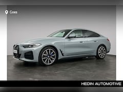 BMW i4 - eDrive40 High Executive 84 kWh | M Sportpakket | Elektrisch bediend glazen schuif-/kanteld