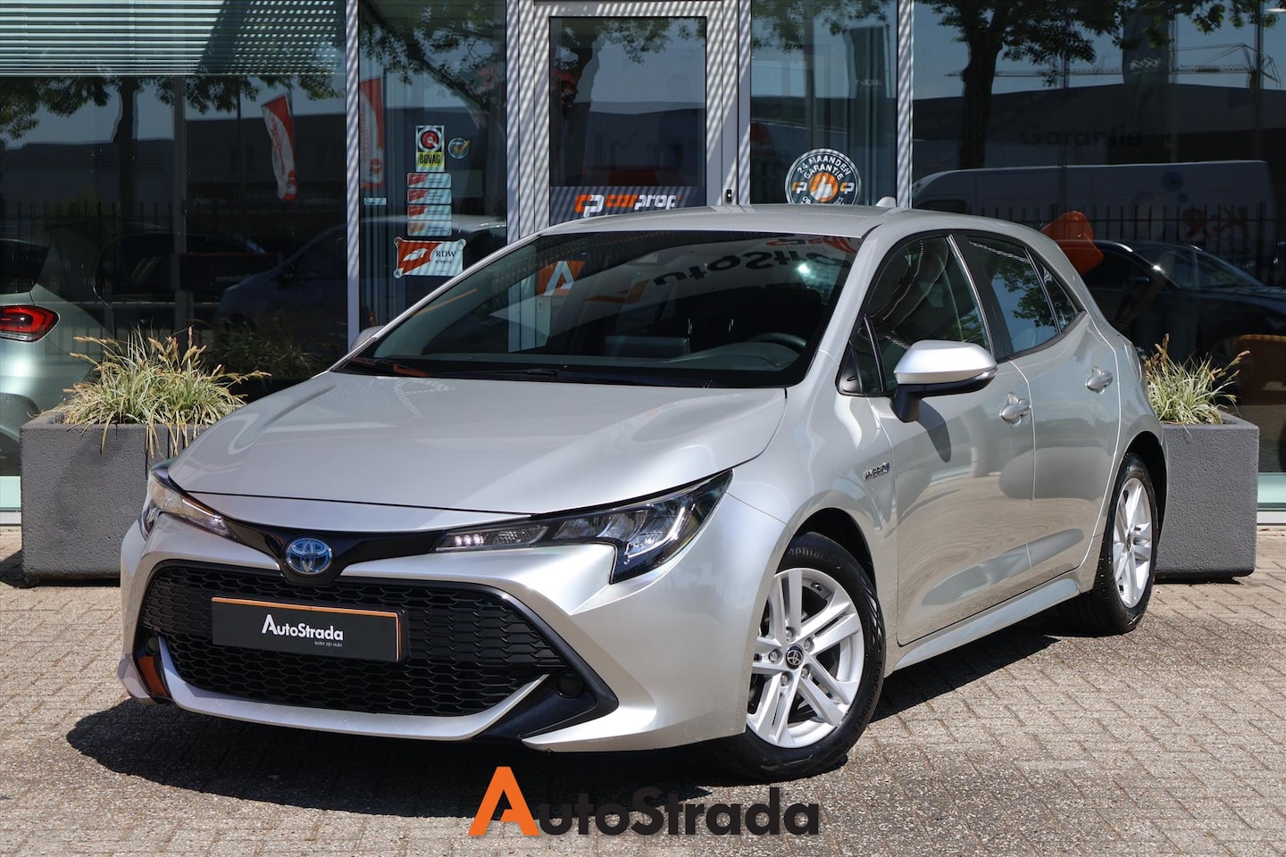 Toyota Corolla - 1.8 Business Hybrid 122pk | Carplay | DAB | Camera | Adaptive | Climate | LED - AutoWereld.nl