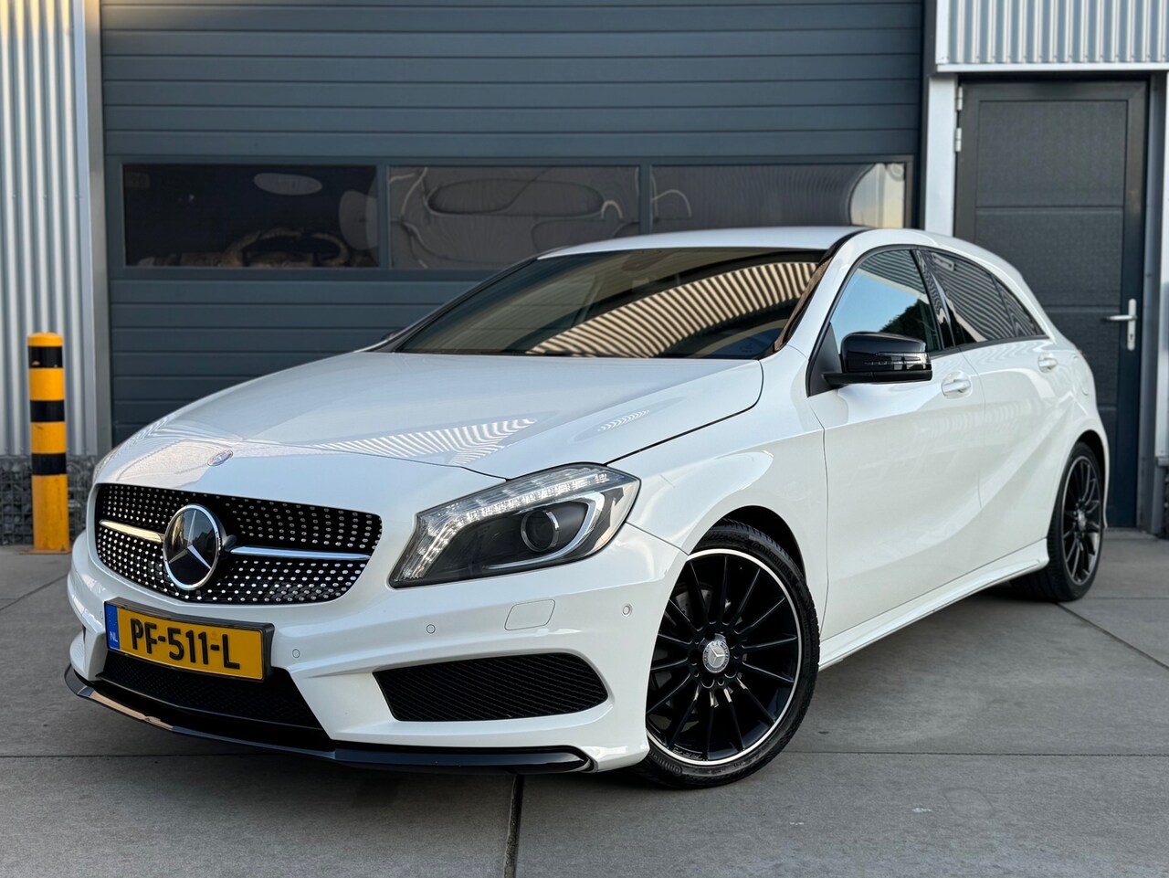 Mercedes-Benz A-klasse - 180 Ambition AMG / CLIMA / CRUISE / PDC - AutoWereld.nl