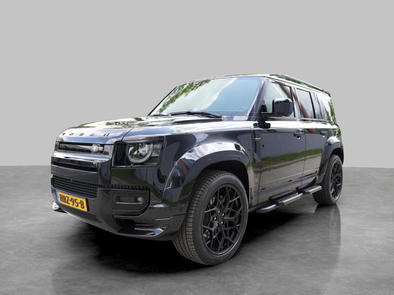Land Rover Defender 110 - 2.0 P300e X-Dynamic Urban PHEV HSE - AutoWereld.nl
