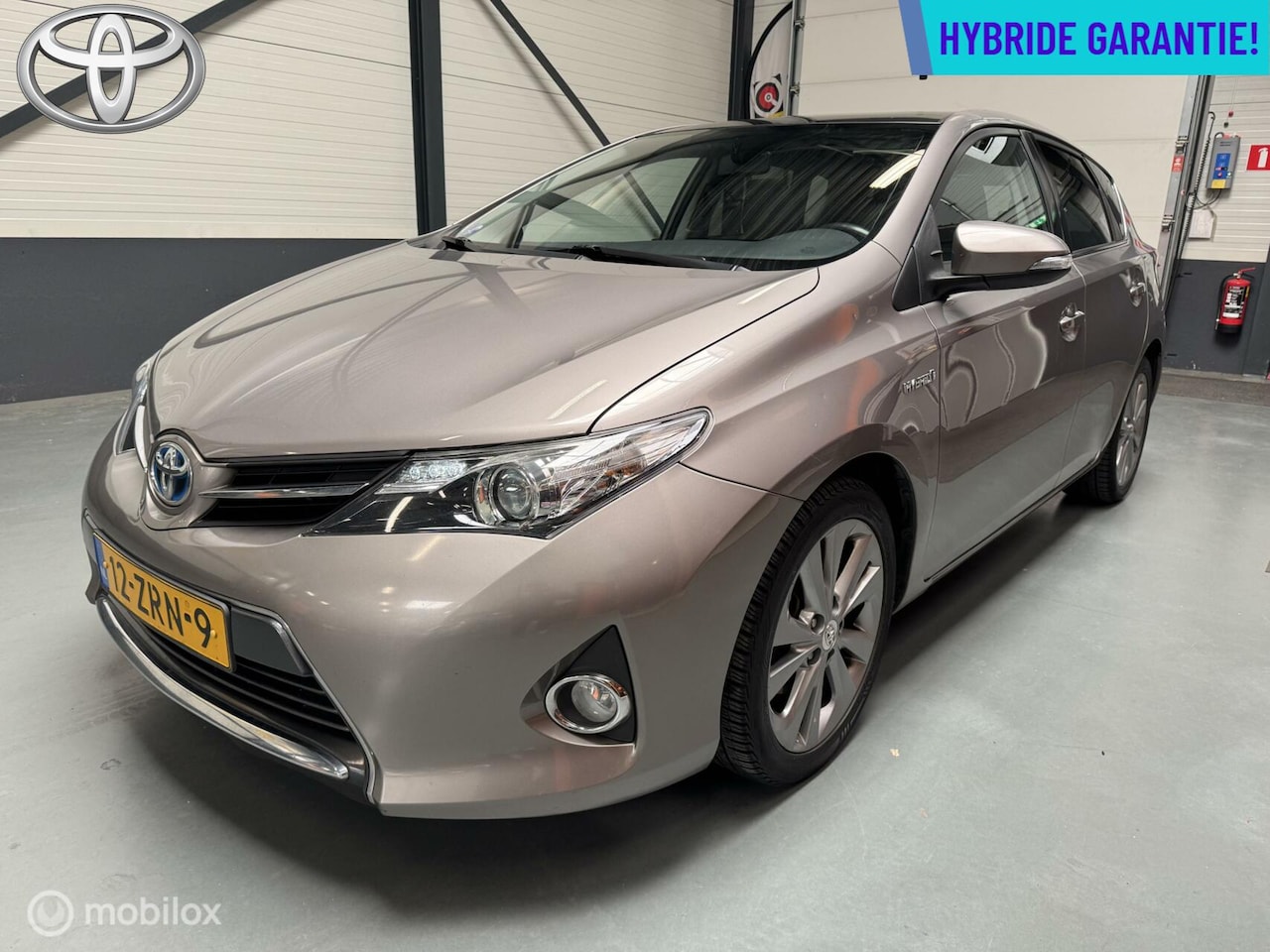 Toyota Auris - 1.8 Hybrid Lease Navi|Pano|Camera|17"LM-Velgen - AutoWereld.nl