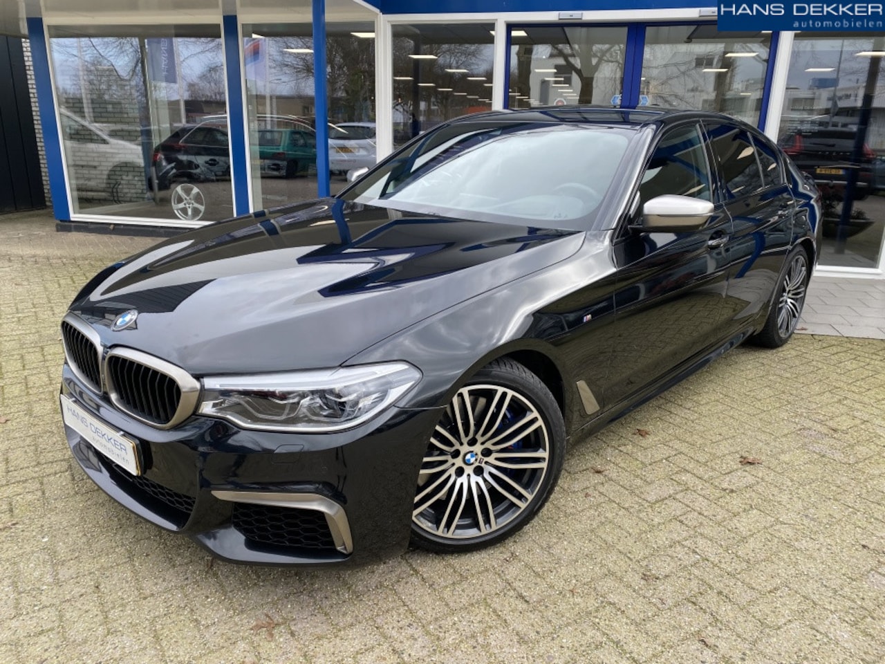 BMW 5-serie - GERESEVEERD M550i xDrive High Executive leer/navigatie/automaat - AutoWereld.nl