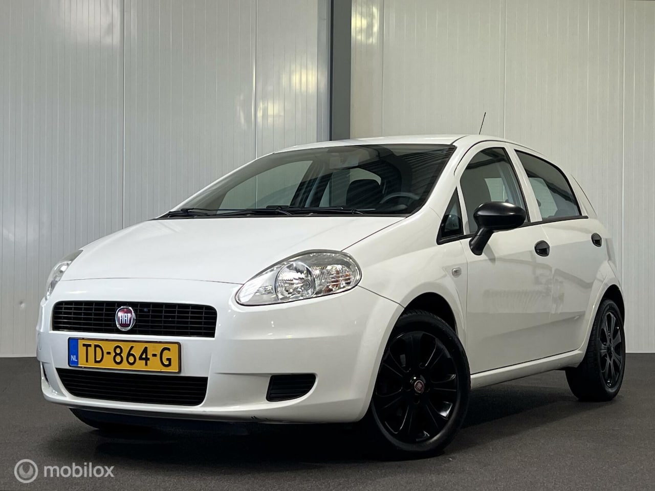 Fiat Punto Evo - 1.2 Pop 5-drs [ historie airco LM velgen ] - AutoWereld.nl