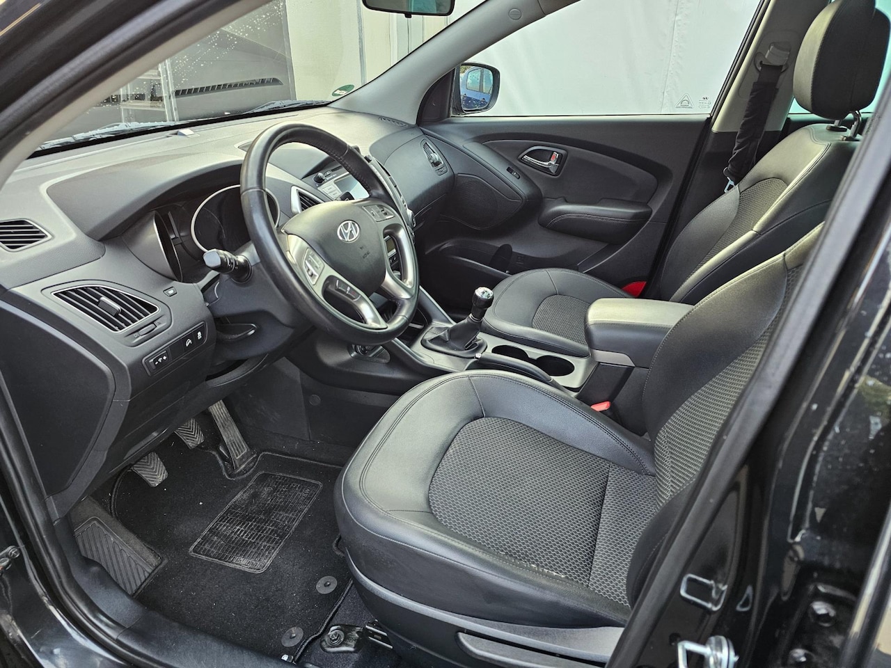 Hyundai ix35 - 2.0i Style PANORAMA/airco/CRUISE - AutoWereld.nl