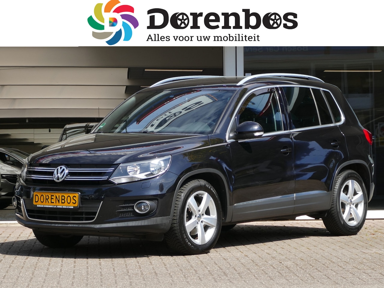 Volkswagen Tiguan - 1.4 TSI Sport&Style | stoelverwarming | trekhaak | navigatie | all-season-banden - AutoWereld.nl
