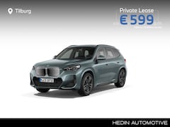 BMW iX1 - eDrive20 M Sportpakket | M Adaptief Onderstel | Trekhaak | Panoramadak | Premium Pack | Co