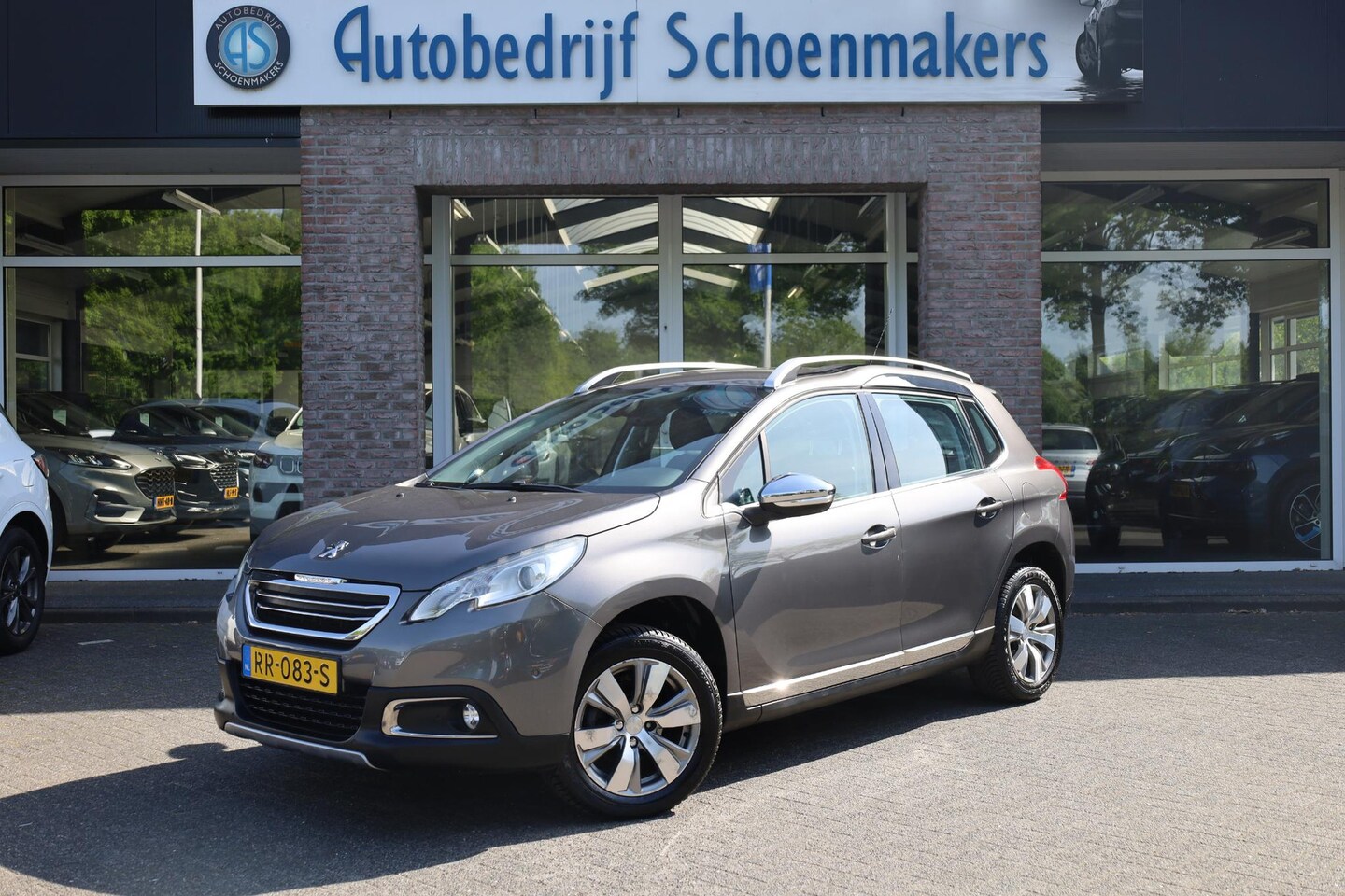 Peugeot 2008 - 1.2 PureTech Allure TREKHAAK-AFN CRUISE HALFLEER NAVI 2xPDC CLIMA LMV - AutoWereld.nl