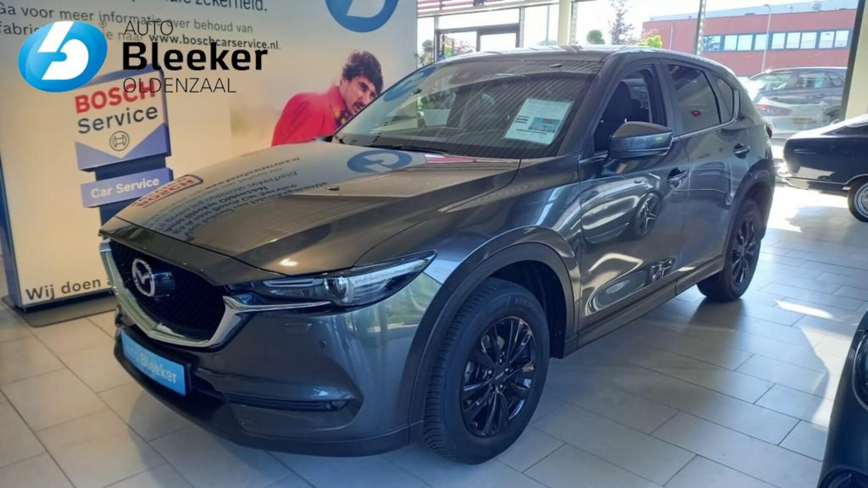 Mazda CX-5 - 2.0 SAG 165 Comfort Airco Cruise Navi HUD Carplay Stoel stuur ve - AutoWereld.nl