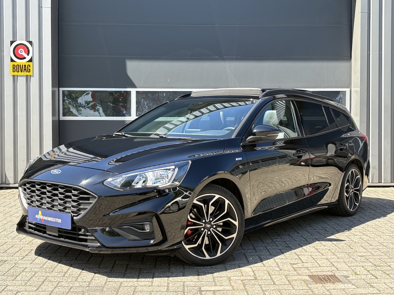 Ford Focus Wagon - 1.5 EcoBoost ST Line Business | Pano | Navi | Camera | Trekhaak | Half Leder | Carplay | 1 - AutoWereld.nl
